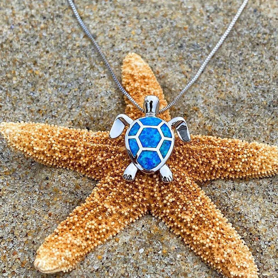 Kailea – Silver-tone turtle jewelry set featuring shimmering stone accents (necklace + earrings)