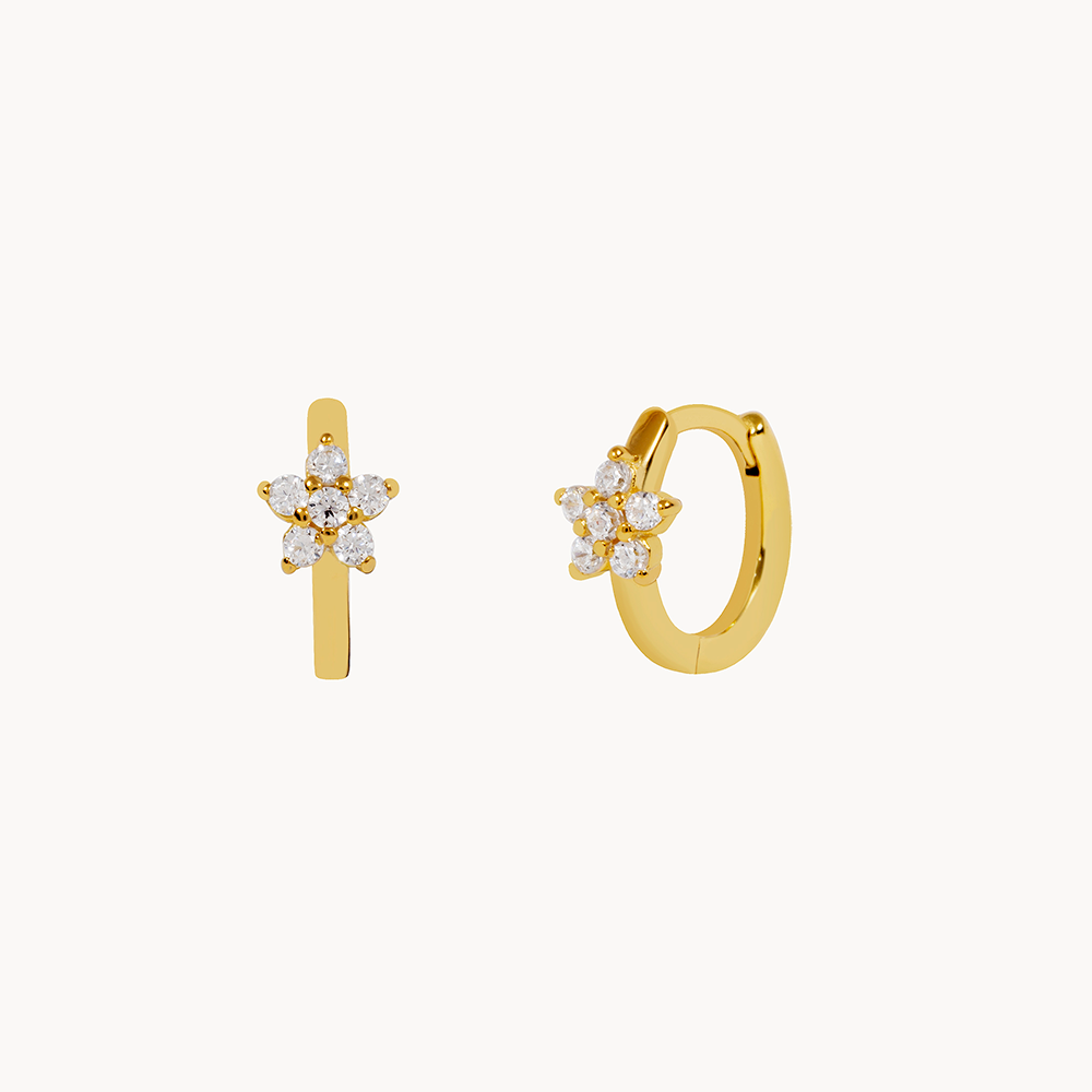 Women's Earring Featuring an Embedded Star Design and Round Stone Setting