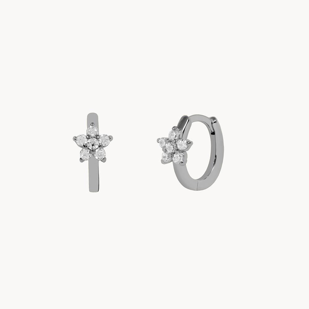 Women's Earring Featuring an Embedded Star Design and Round Stone Setting