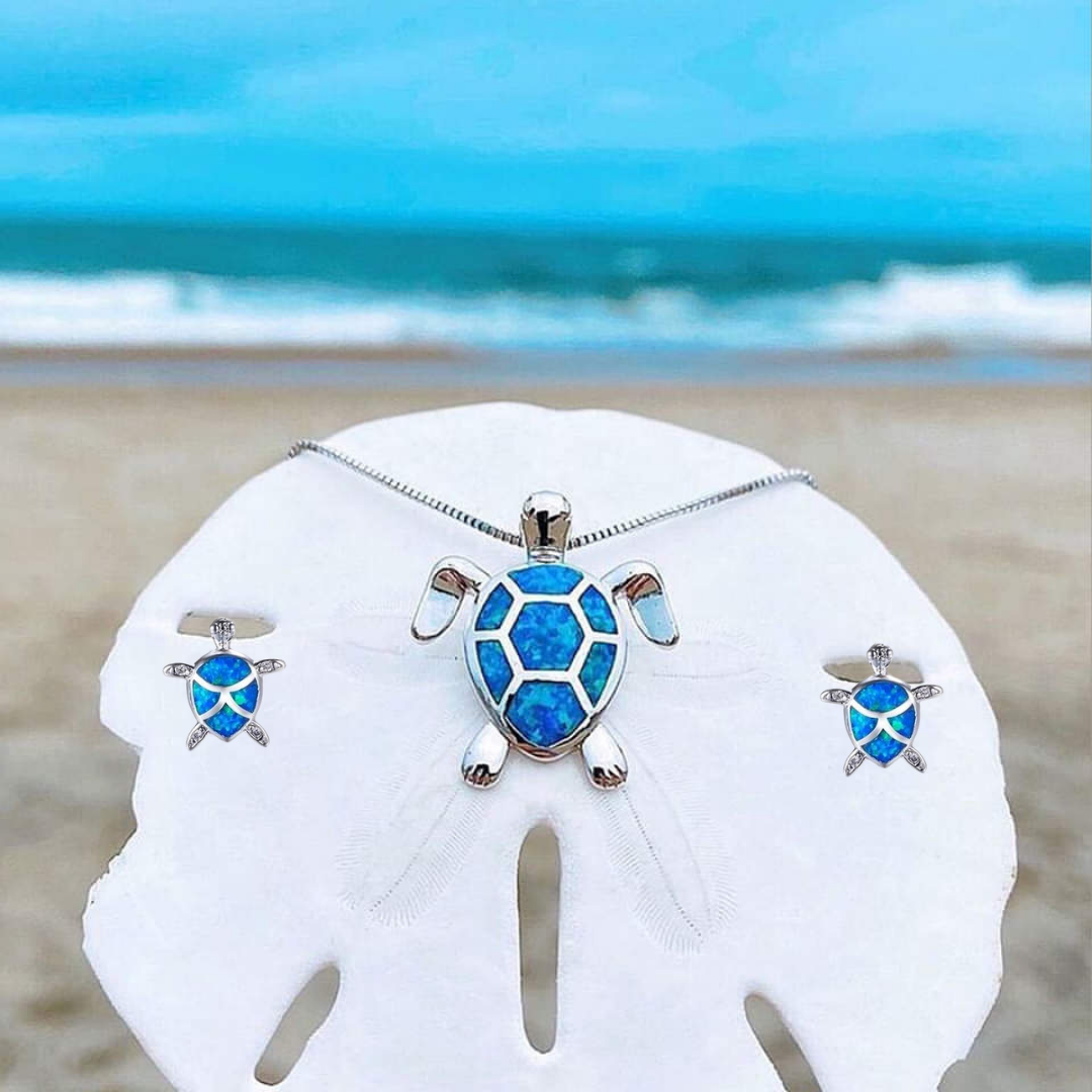 Kailea – Silver-tone turtle jewelry set featuring shimmering stone accents (necklace + earrings)
