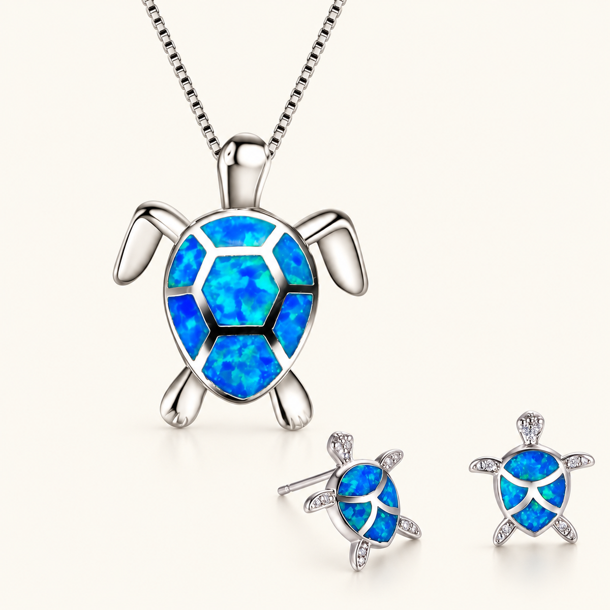Kailea – Silver-tone turtle jewelry set featuring shimmering stone accents (necklace + earrings)