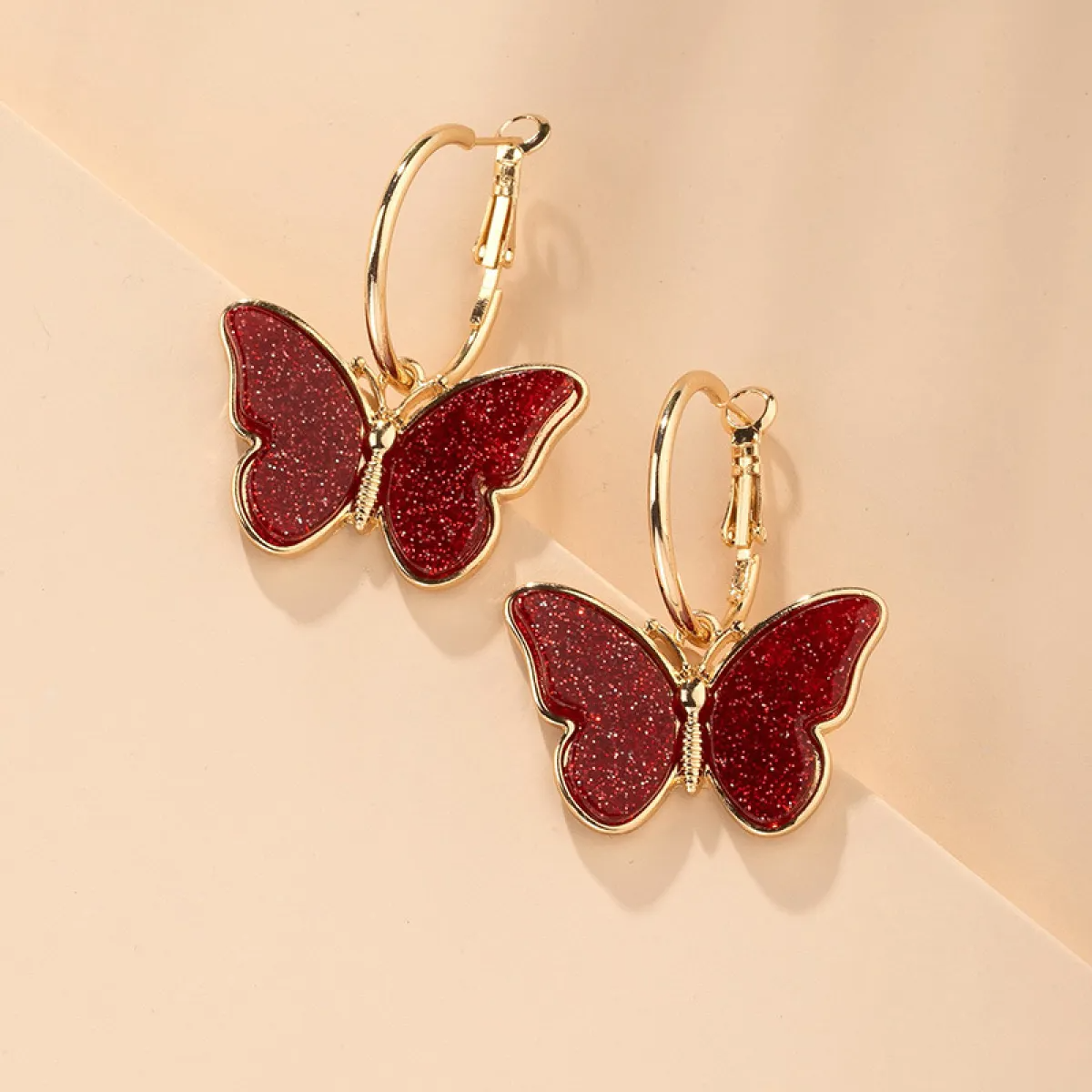 Women’s Butterfly Drop Earrings Featuring Transparent Wing Look and Hoop Style