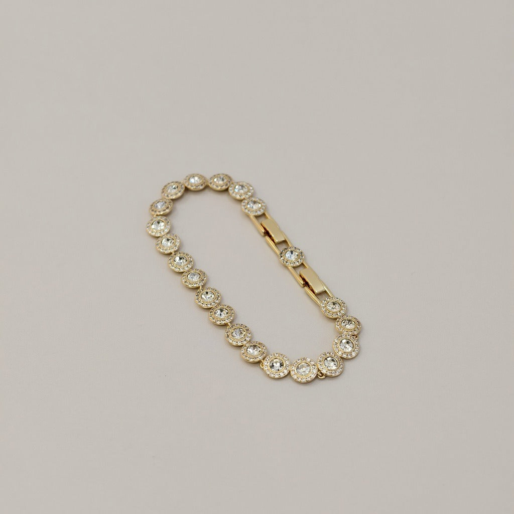Victoria – Necklace and bracelet featuring a shiny round button